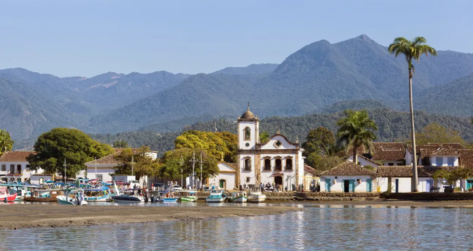 Historic centre of Paraty seen from the quay with the Serra da Bocaina in the background