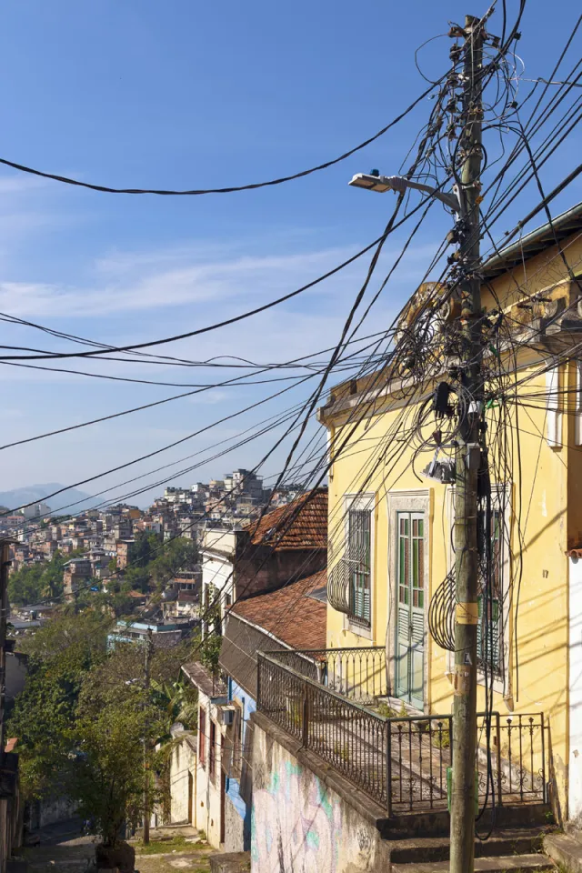Upper end of Andrés Belo Street slope with Tavares Bastos favela in the background