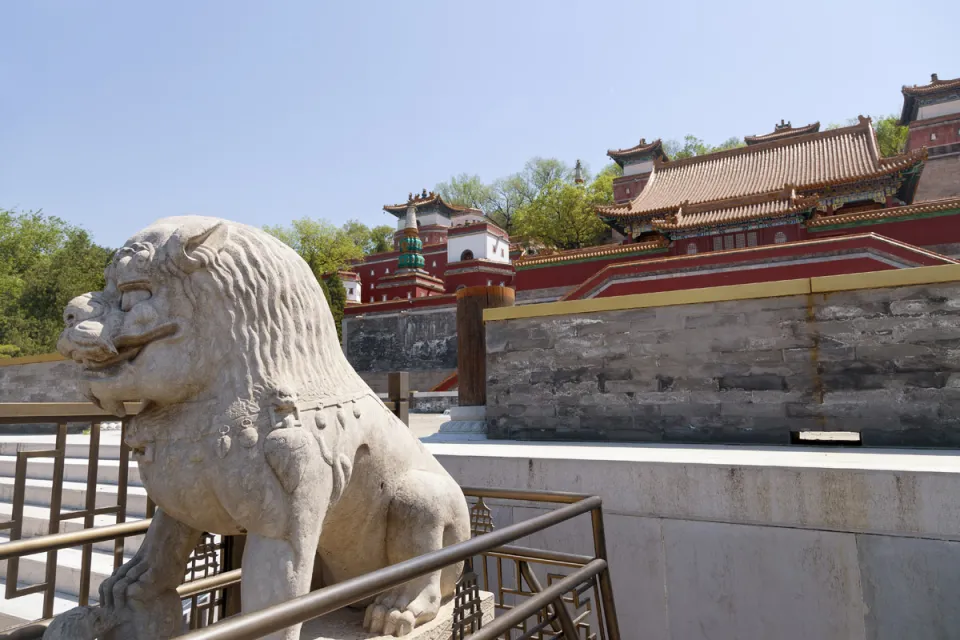 New Summer Palace, Four Great Regions Complex, lion statue in front of the ruins of the Pine Hall