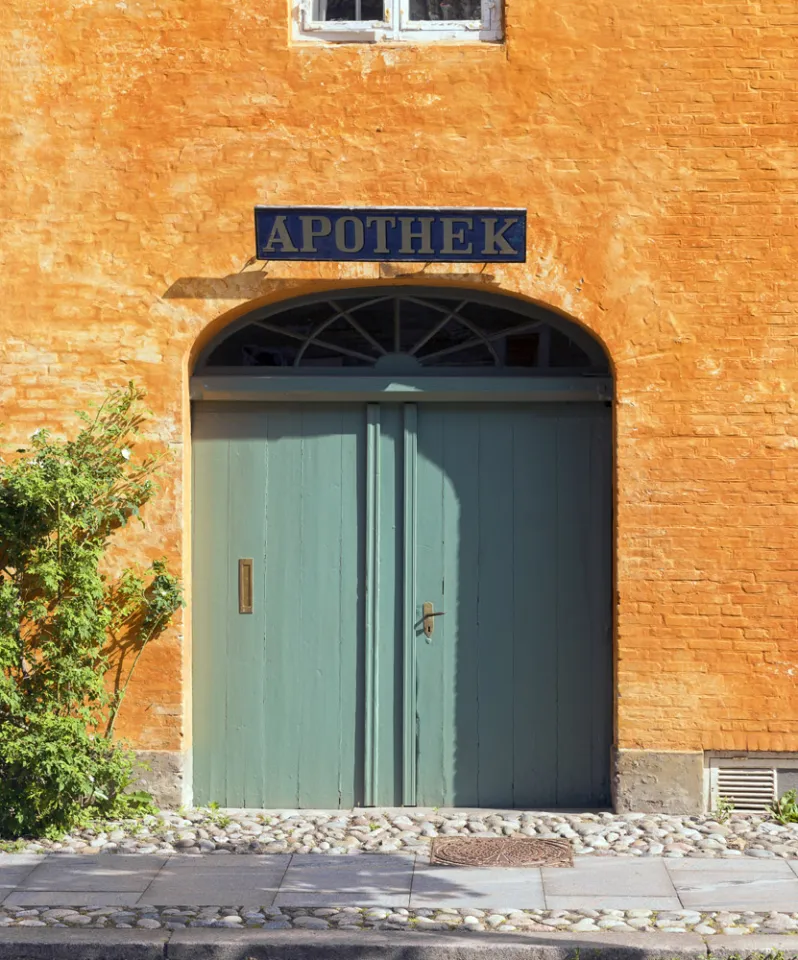 Old Moravian Brethren's pharmacy, gate with old sign