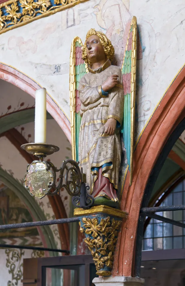 Holy Spirit Hospital, statue of Archangel Michael on the rood screen