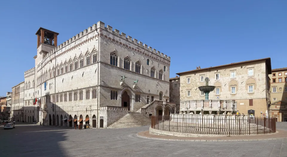 4th of November Square with the Palace of the Priors, the Archiepiscopal Palace, and the Fontana Maggiore