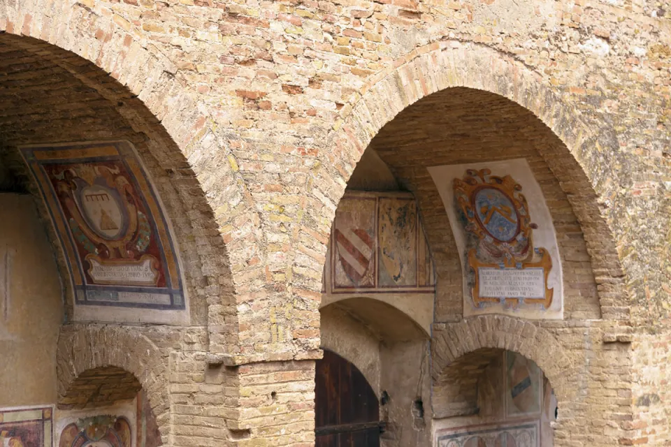 Municipal Palace of San Gimignano, detail of the arcades of the courtyard