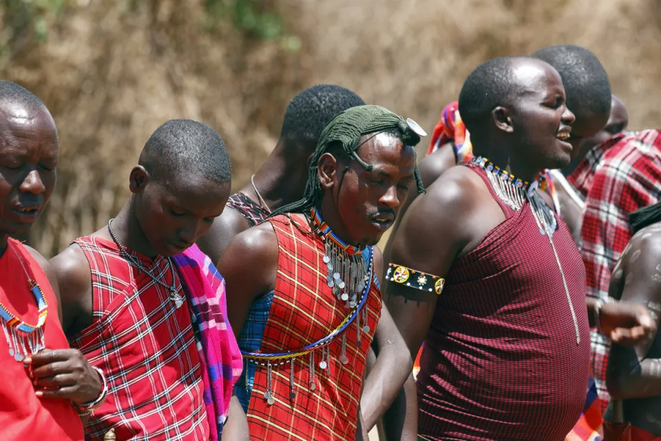 Maasai singing and performing traditional dance