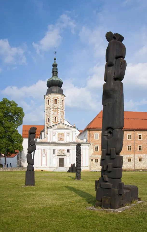 Kostanjevica Cistercian Monastery, artwork of the sculpture park “Forma Viva” in front of the Church of the Annunciation