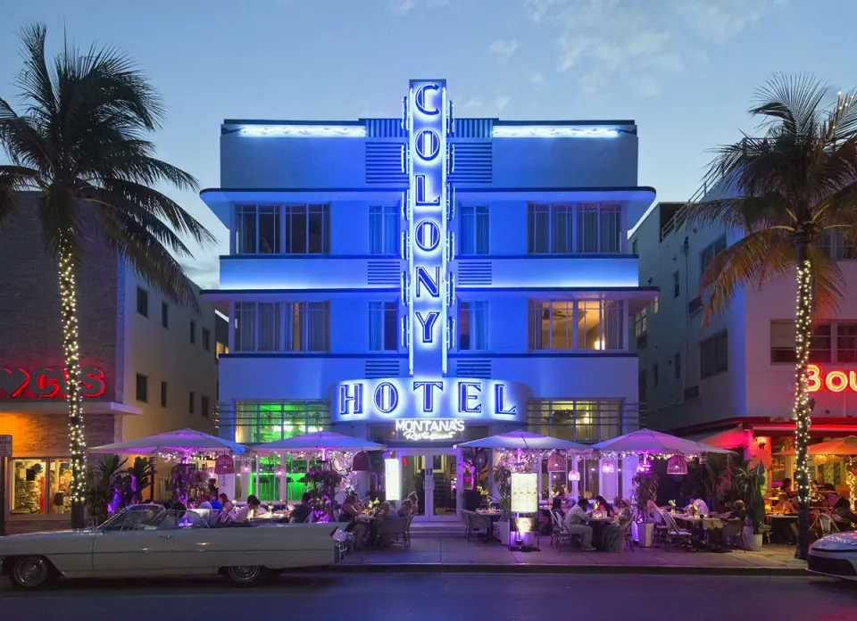 Colony Hotel, illuminated main facade in the evening