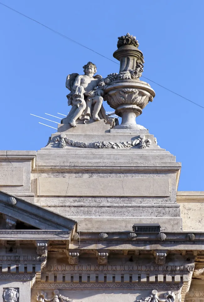 Municipal Palace of Colonia, facade detail with roof sculpture