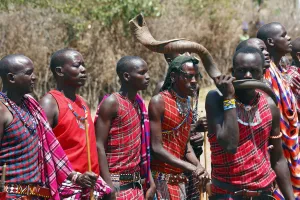 Maasai singing and performing traditional dance