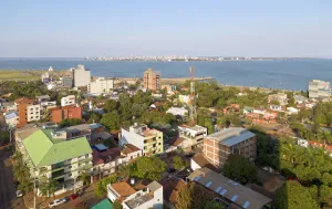 San Blas neighbourhood with the city of Posadas in the background behind the Paraná River