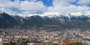 View from Bergisel hill on Innsbruck city centre in front of the North Chain