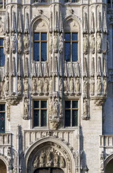 Brussels Town Hall, facade detail of the tower base above the main portal