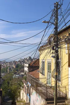 Upper end of Andrés Belo Street slope with Tavares Bastos favela in the background