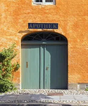 Old Moravian Brethren's pharmacy, gate with old sign