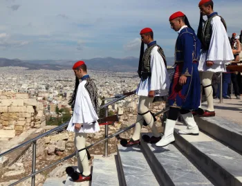 Evzones descending the Acropolis after Liberation Day ceremony