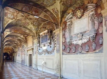 Archiginnasio Palace, second floor gallery with coat of arms paintings and reliefs