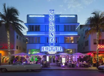 Colony Hotel, illuminated main facade in the evening